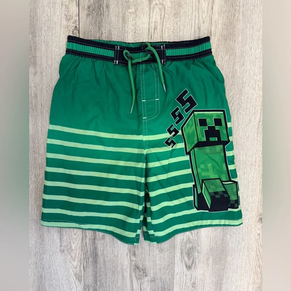 Vibrant Green and Black Minecraft  Swim Trunks with Pixelated Design size 10/12